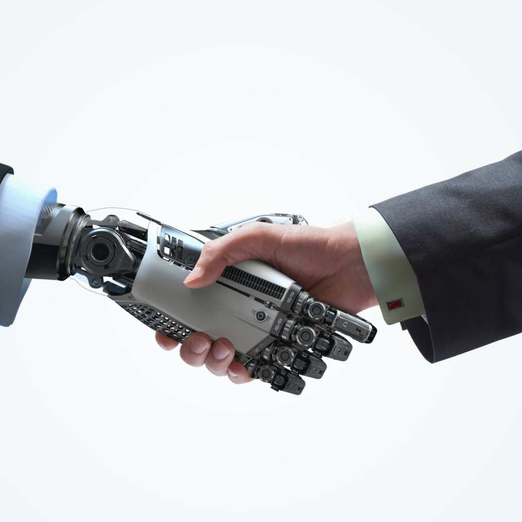 Robot en mens geven elkaar een hand