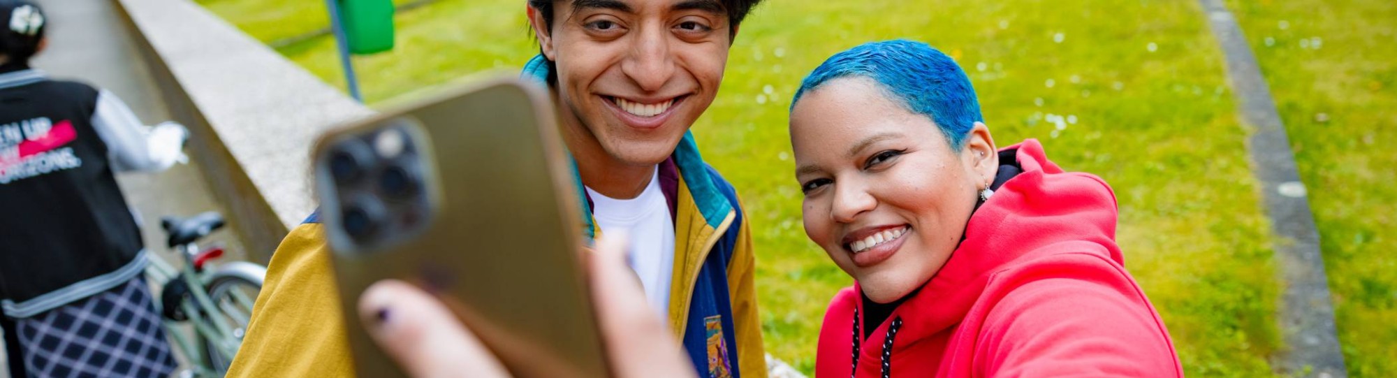 Diego and Chadionne smiling and taking a selfie at Arnhem Campus