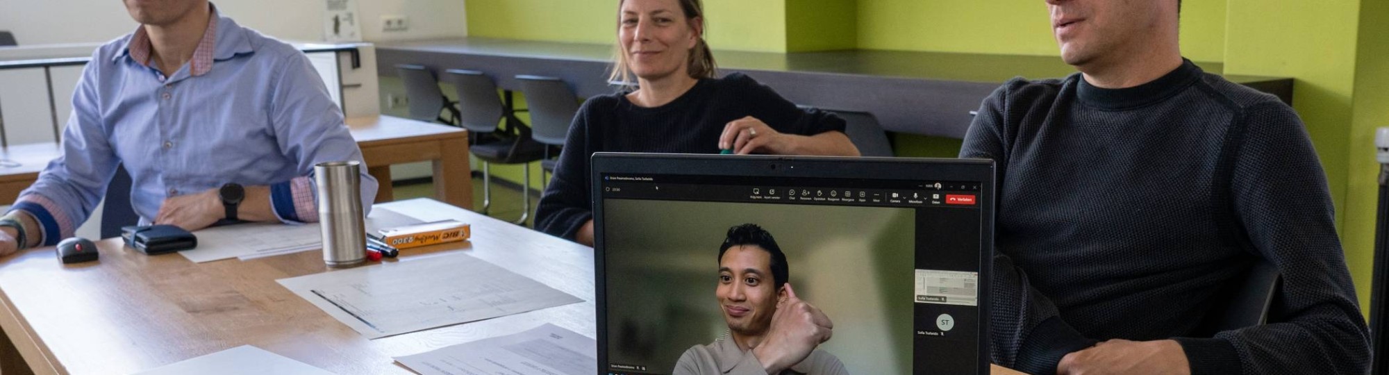 Foto's tijdens een teammeeting van OOI2