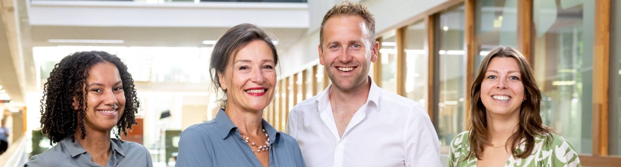 Lectoraat Digitale Transformatie groepsfoto met Lilian Beijer, Geert Frederix, Beau Cox, Robin Vermeulen