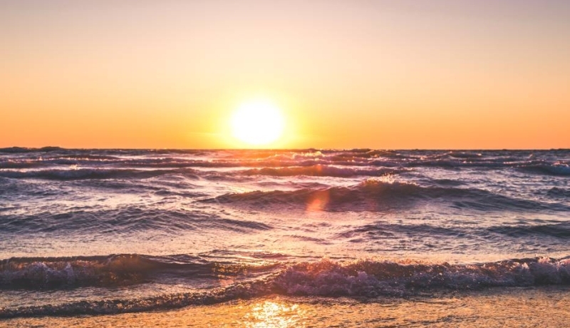 Zonsopkomst aan het strand
