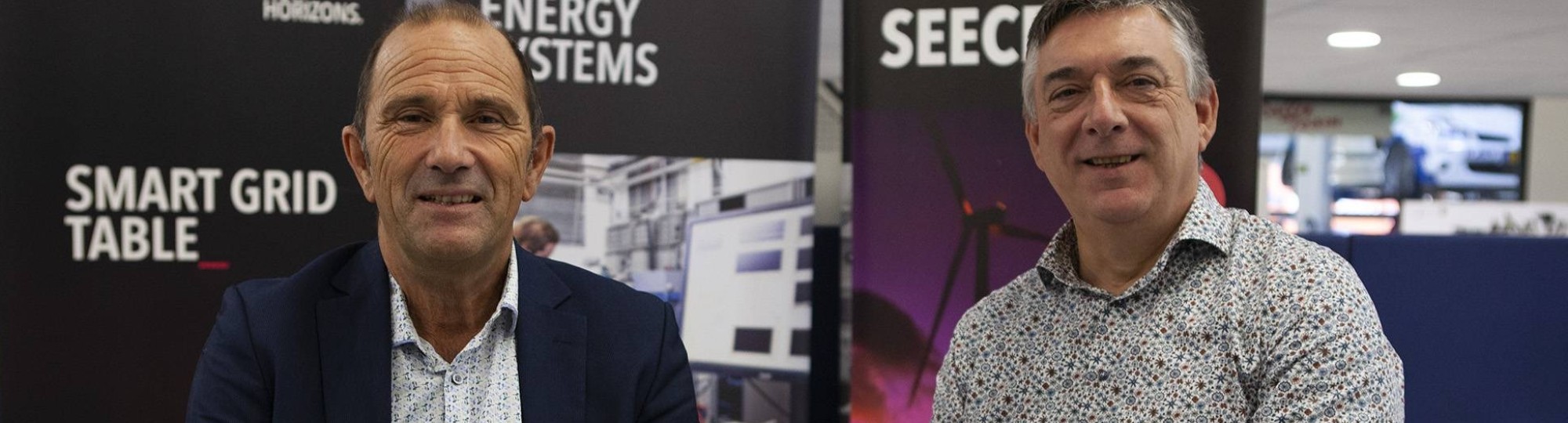 Tinus Hammink en Herman Janssen bij de Smart Grid Demo Table