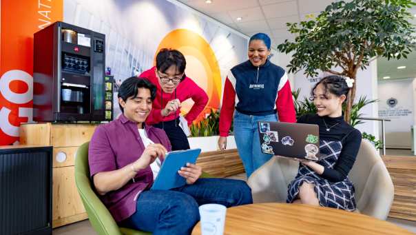 International students studying in the lounge on the Arnhem campus of HAN University of Applied Sciences. 