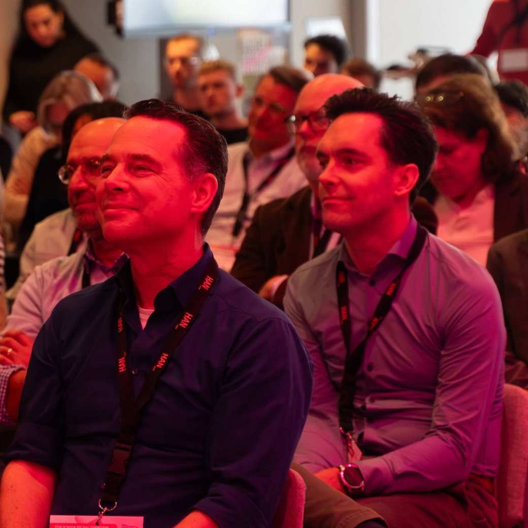 Bezoekers van het symposium