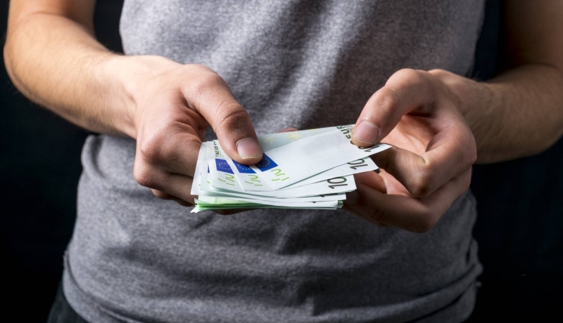 Armoede in beeld. Geld tellen
