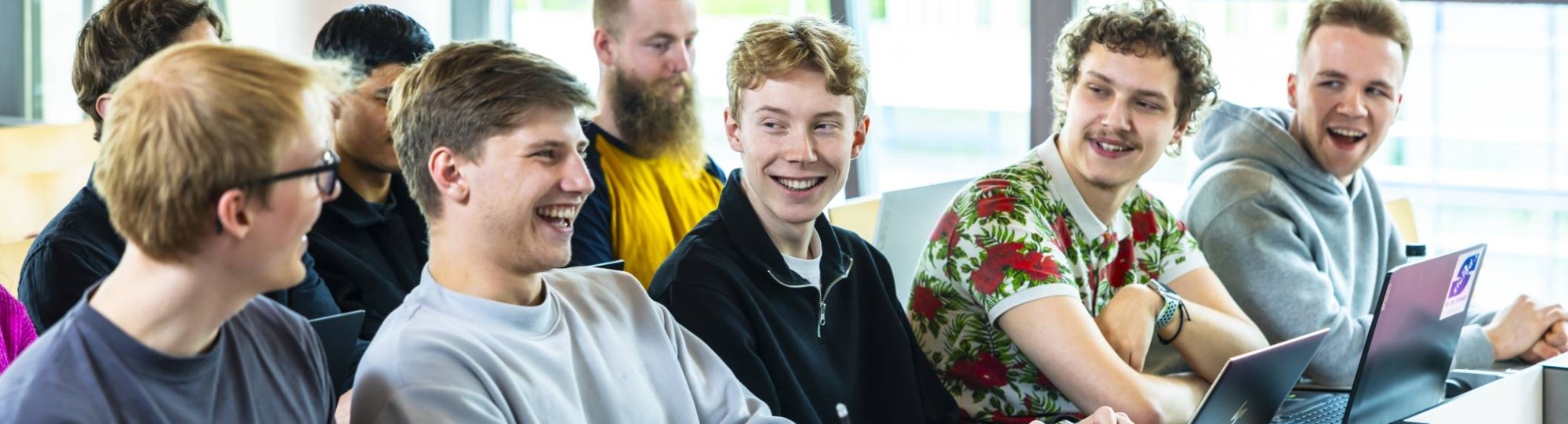 Studenten ICT in collegezaal