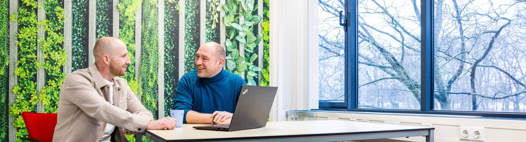 Twee arbeidsdeskundigen in gesprek