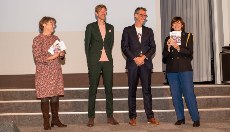 Een foto van de lectorale rede van Bauke Koekkoek bij de Politieacademie.
