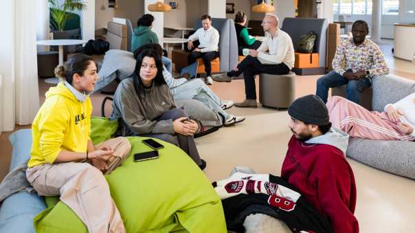 A group of students Master International Social Work meet at central area.